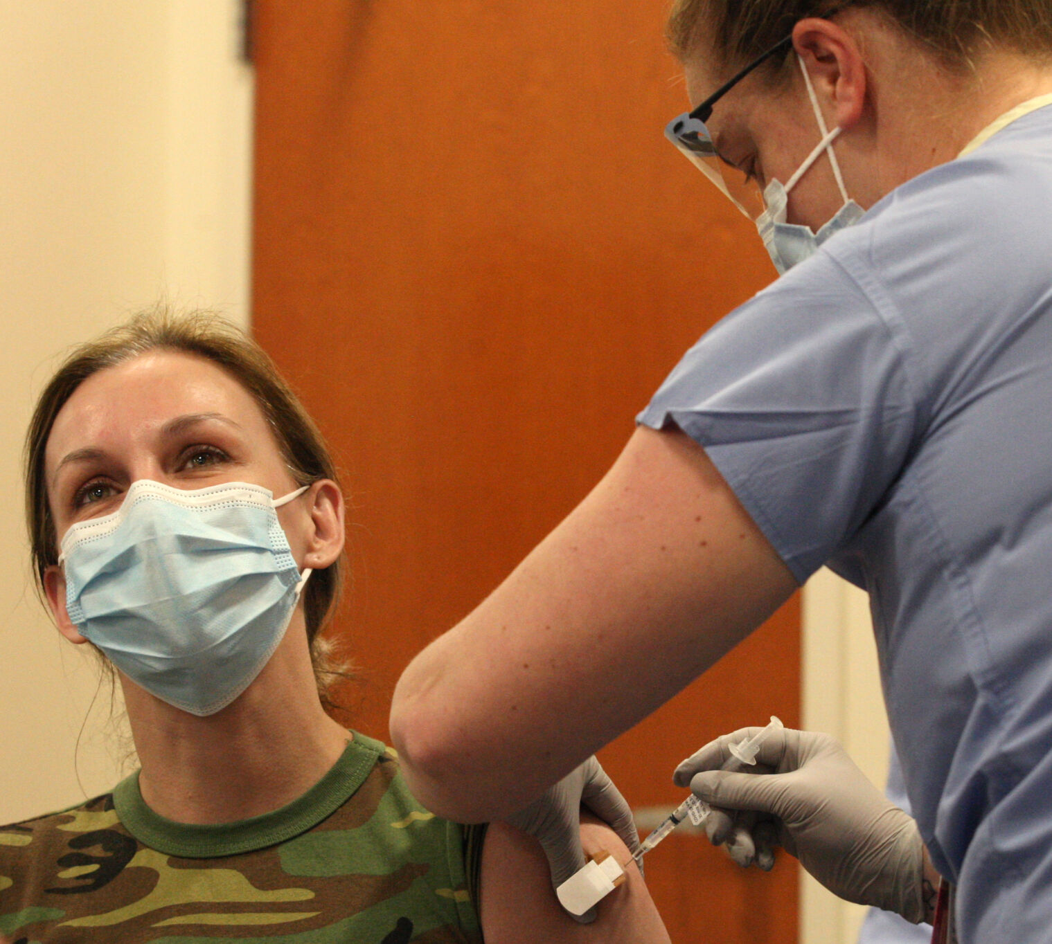 Dr. Ann-Elizabeth Mohart receives a COVID-19 vaccination